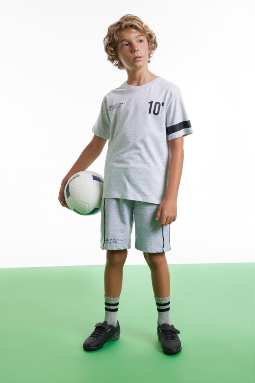 أولاد ميلانج رمادي فاتح شورت اولادي قماش رقيق