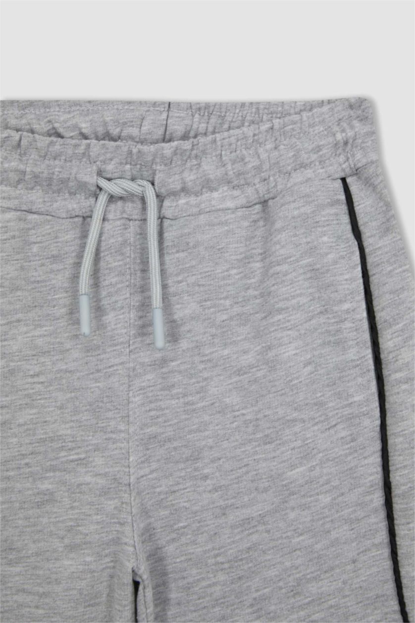 أولاد ميلانج رمادي فاتح شورت اولادي قماش رقيق