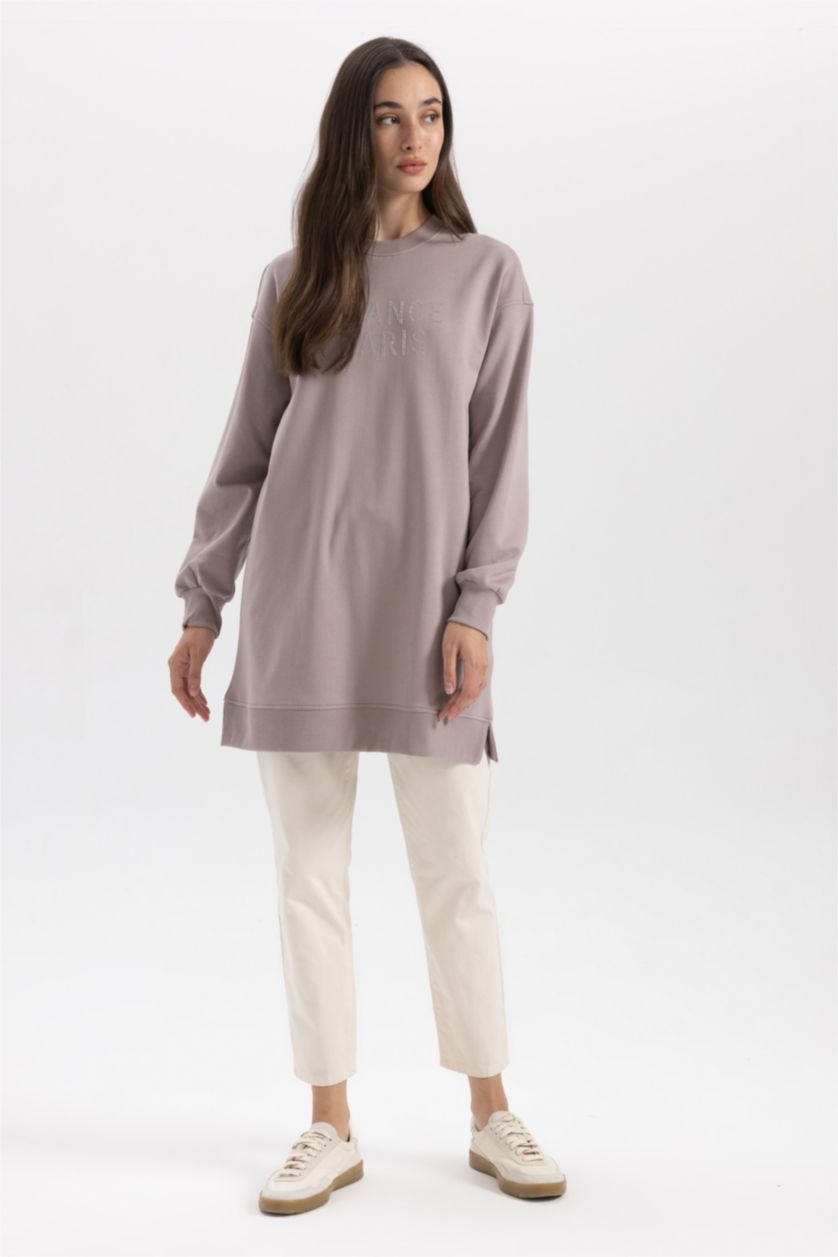 حريمي وردي فاتح سويت تونيك قماش رقيق قصة عادية