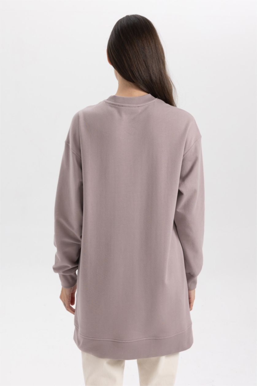 حريمي وردي فاتح سويت تونيك قماش رقيق قصة عادية