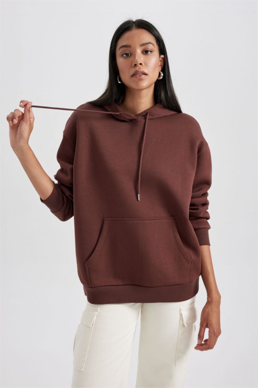 حريمي بني سويت شيرت بقصة مريحة بكابيشون