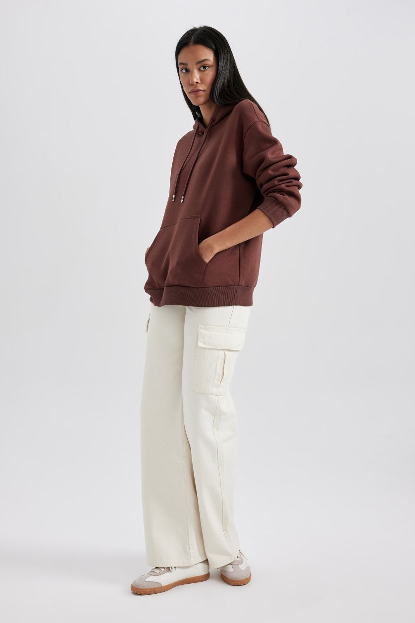 حريمي بني سويت شيرت بقصة مريحة بكابيشون