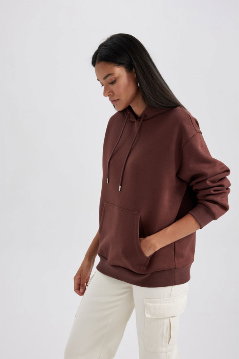 حريمي بني سويت شيرت بقصة مريحة بكابيشون