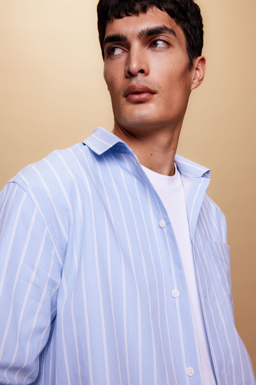 رجالي أزرق فاتح قميص بولو مخطط كم طويل قصة مريحة