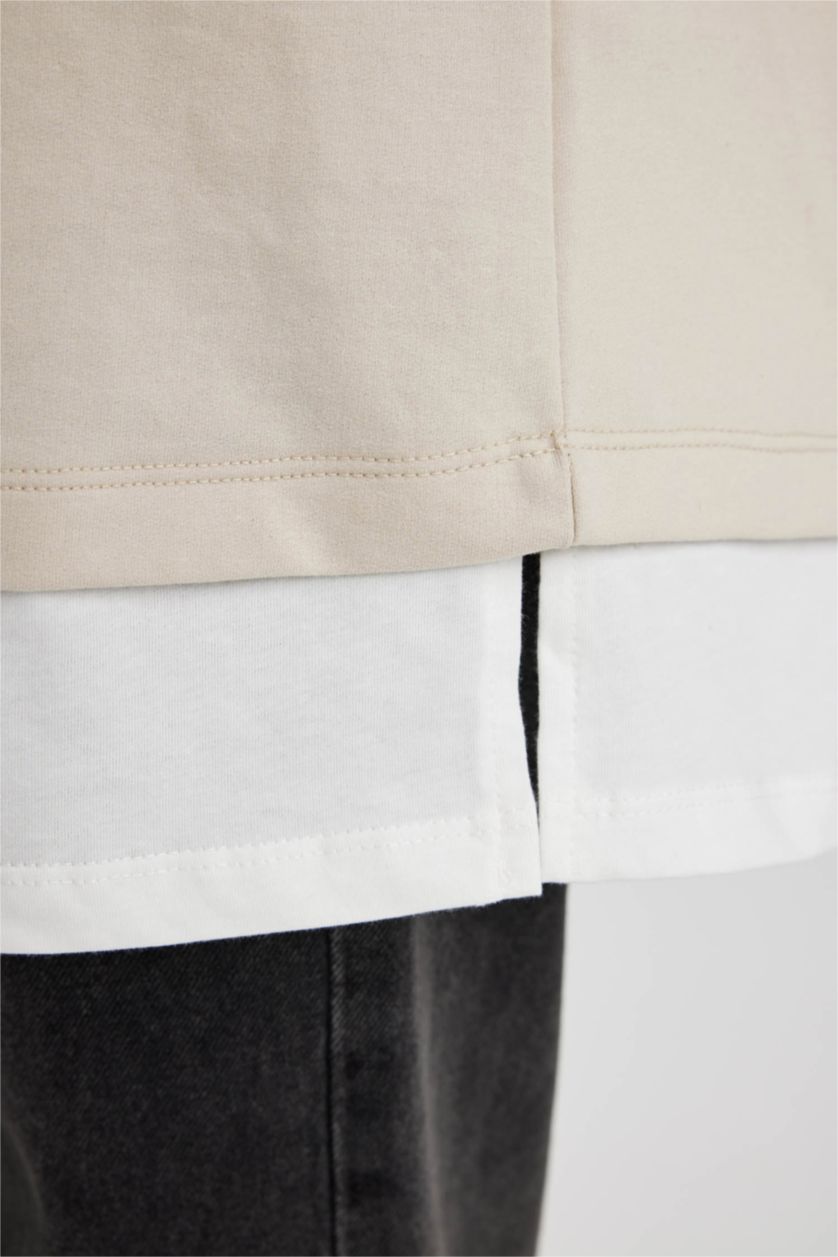 نساء بيج فاتح سويت تونيك قماش رقيق قصة عادية بياقة مستديرة