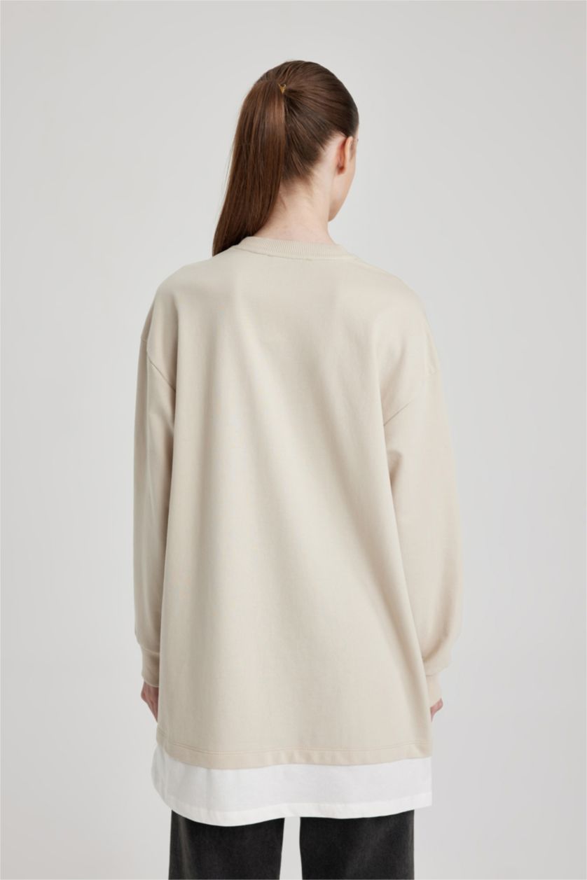 نساء بيج فاتح سويت تونيك قماش رقيق قصة عادية بياقة مستديرة