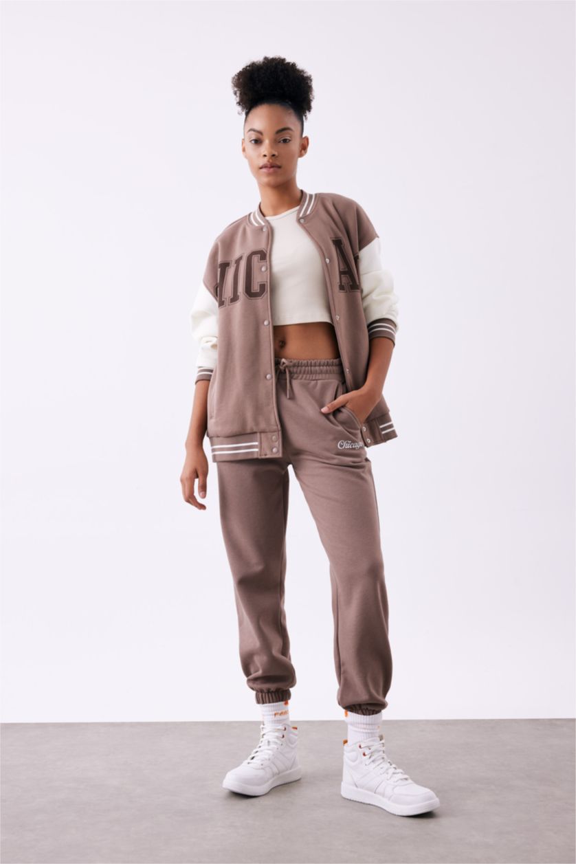 حريمي بني فاتح بنطلون سويت بانتس بريميوم قصة عادية بجيب