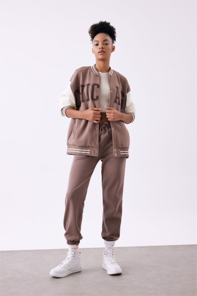 حريمي بني فاتح بنطلون سويت بانتس بريميوم قصة عادية بجيب