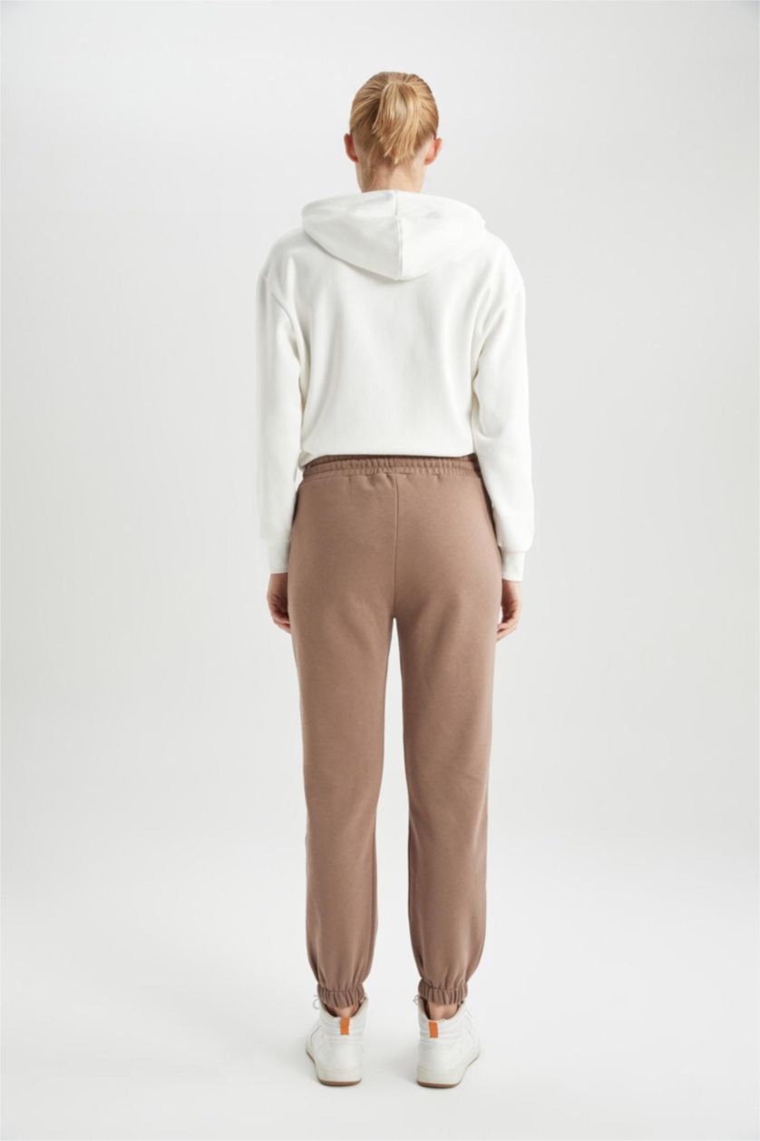 حريمي بني فاتح بنطلون سويت بانتس بريميوم قصة عادية بجيب