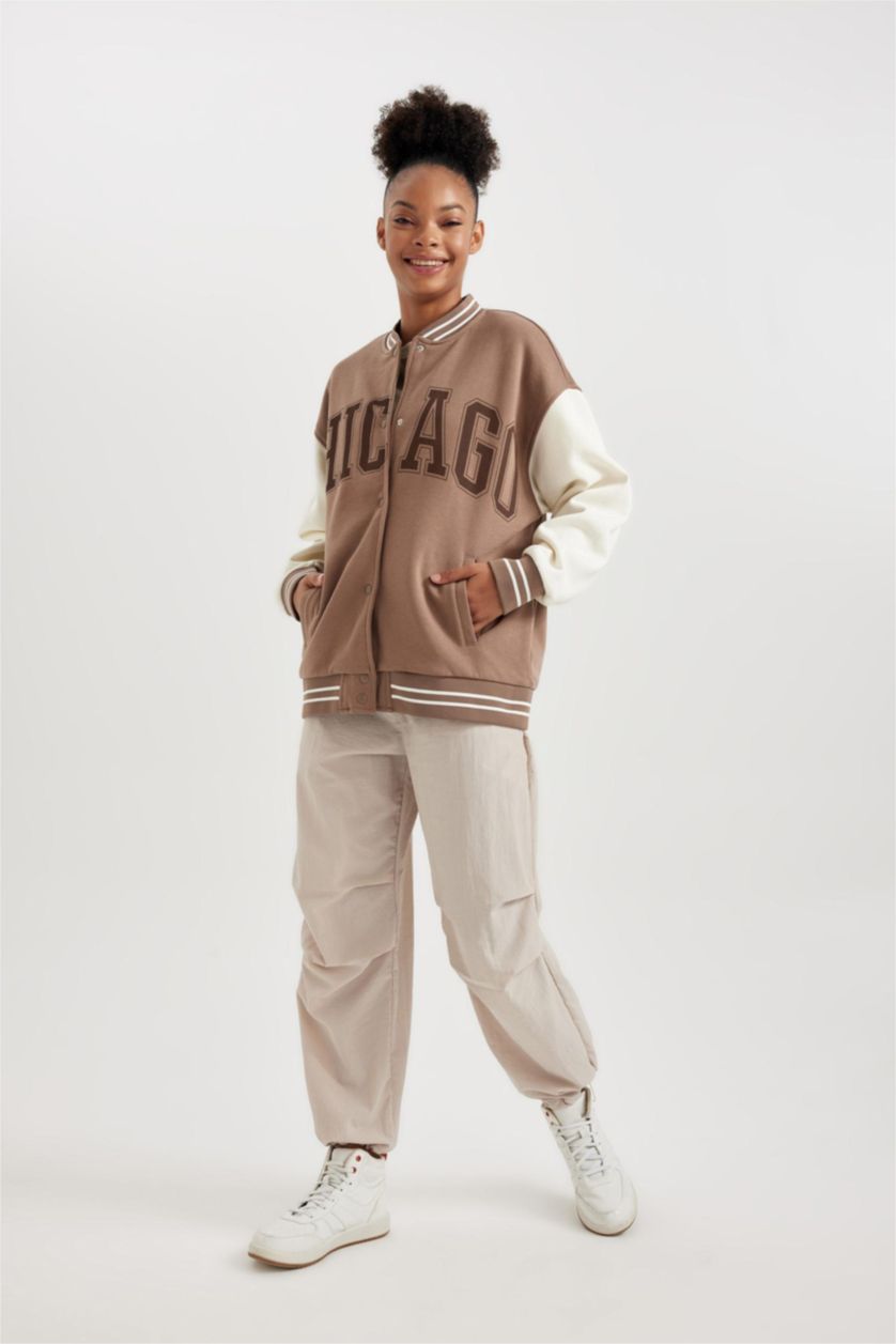 حريمي اللون الحجري بنطلون جوجر قصة عادية بأستك من تحت بجيب من DeFactoFit