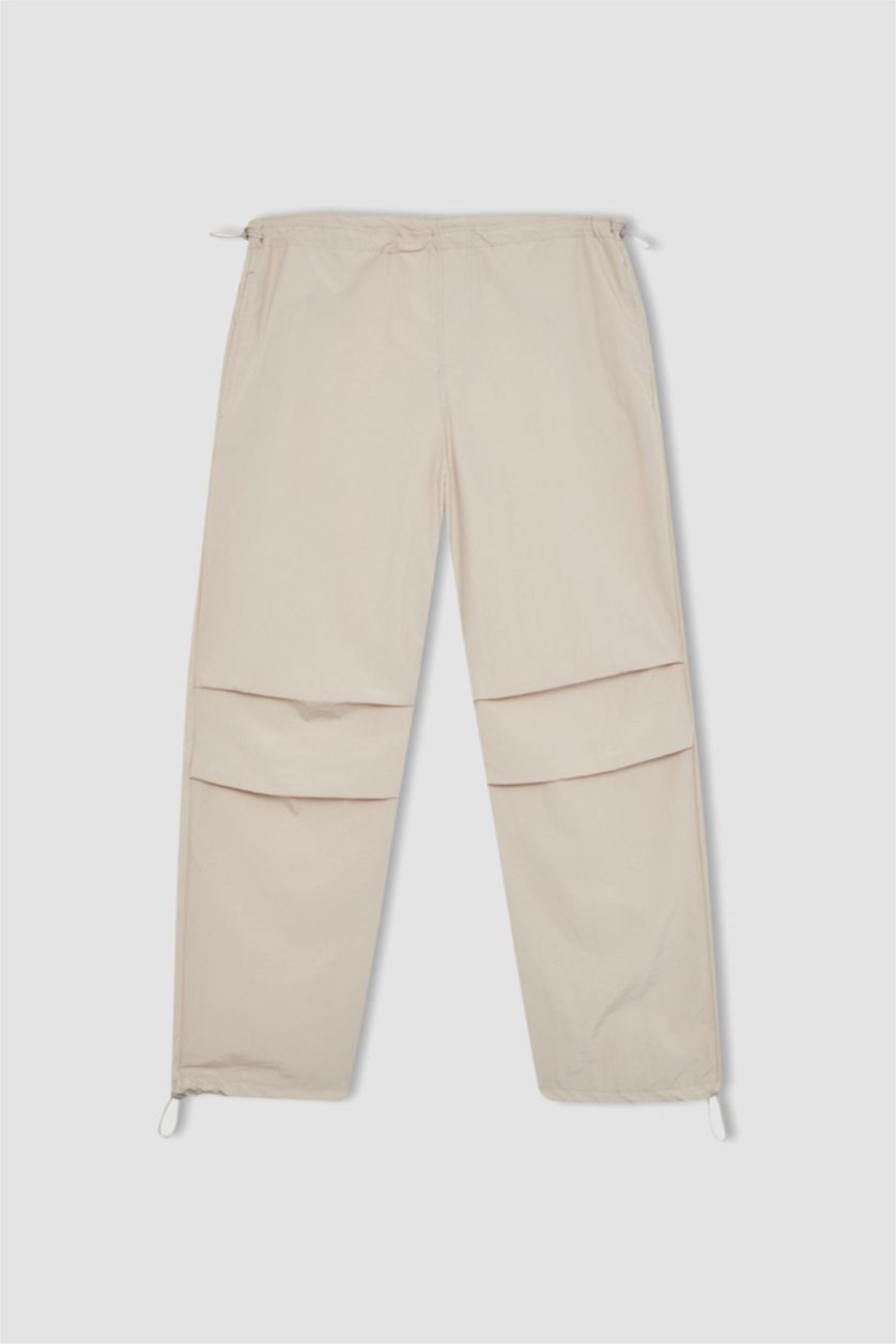 حريمي اللون الحجري بنطلون جوجر قصة عادية بأستك من تحت بجيب من DeFactoFit