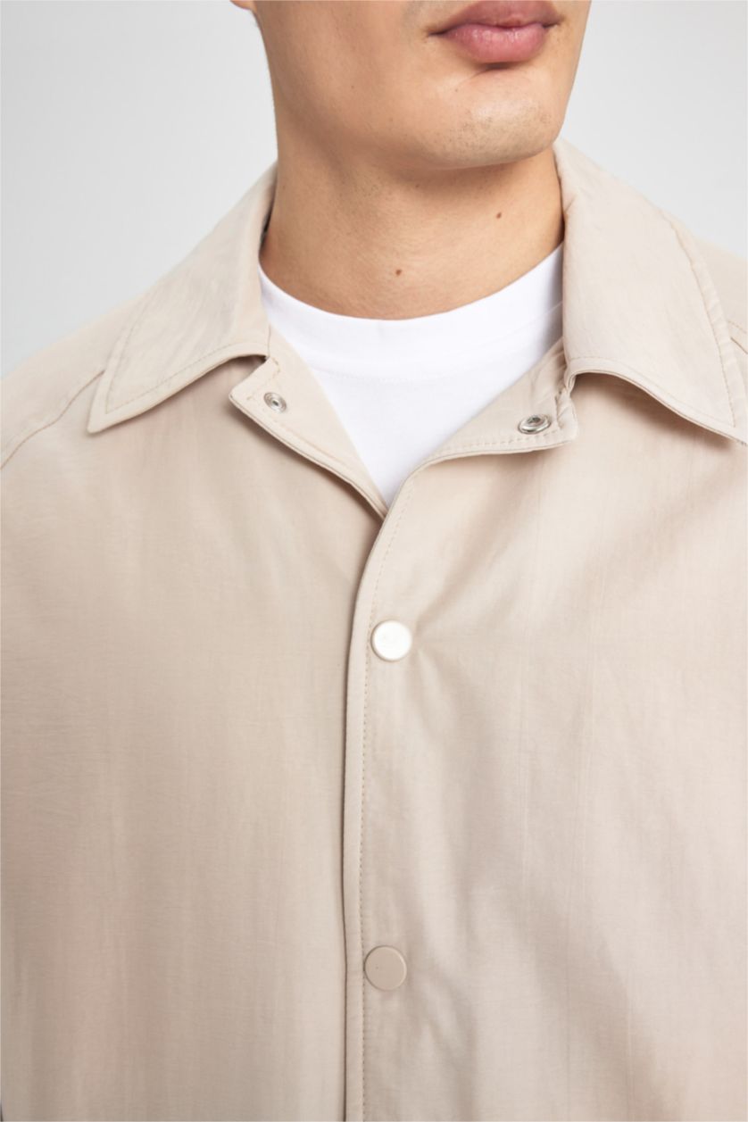 رجال بيج جاكيت قصة مريحة برقبة بولو