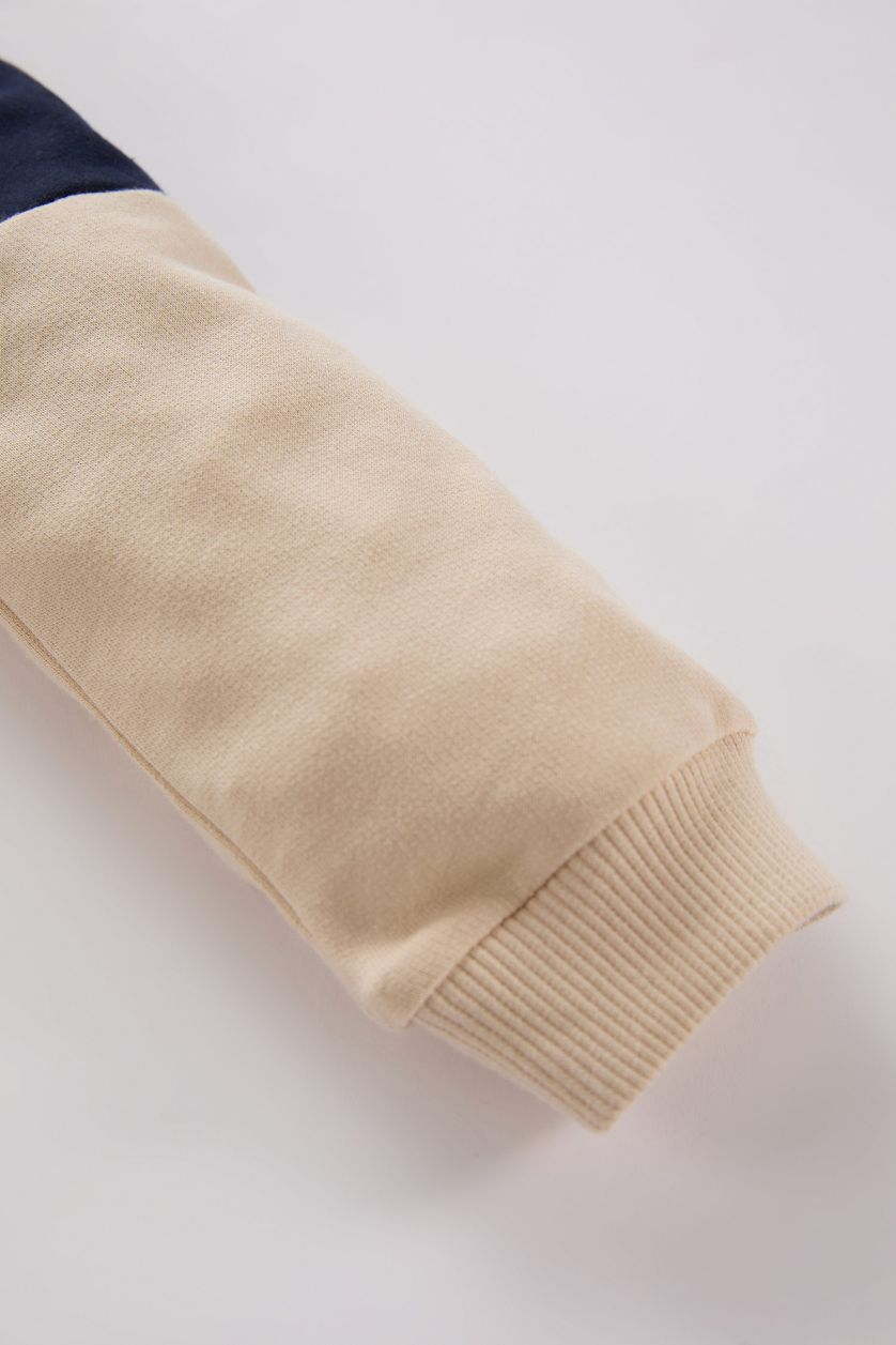 مولود ذكر كحلي سويت شيرت ملون قصة عادية برقبة بأزرار ببطانة ناعمة للبيبي ولد