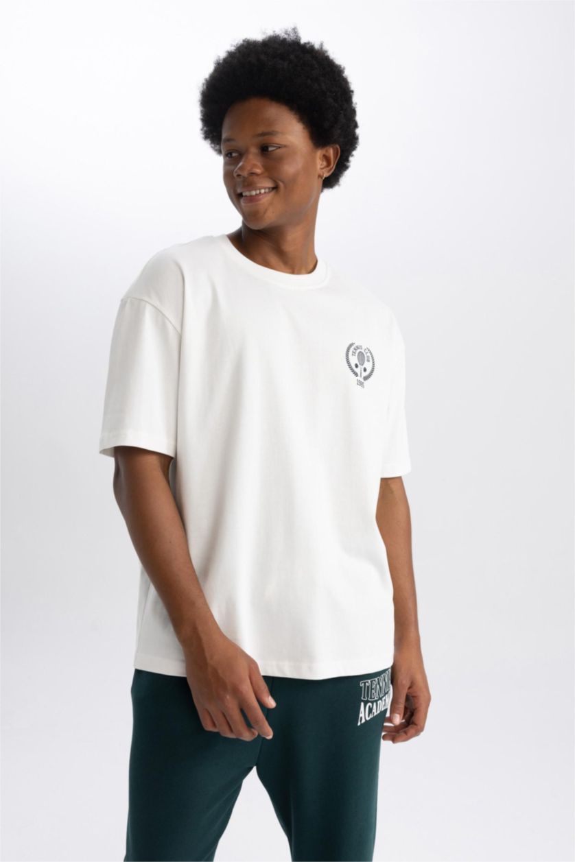 رجالي بيج فاتح تيشيرت اوفر سايز بطبعة شعار من DeFactoFit