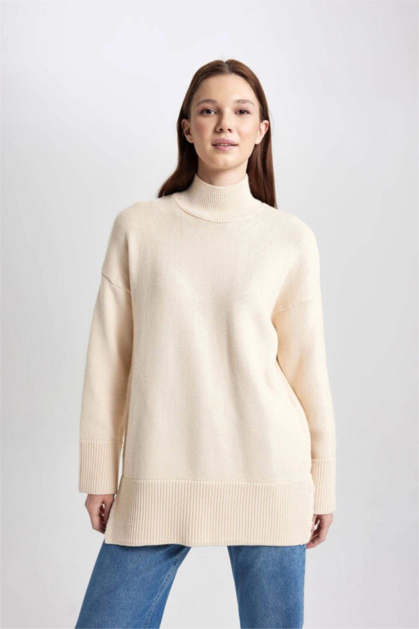 حريمي بيج فاتح تونيك قصة عادية بياقة عالية