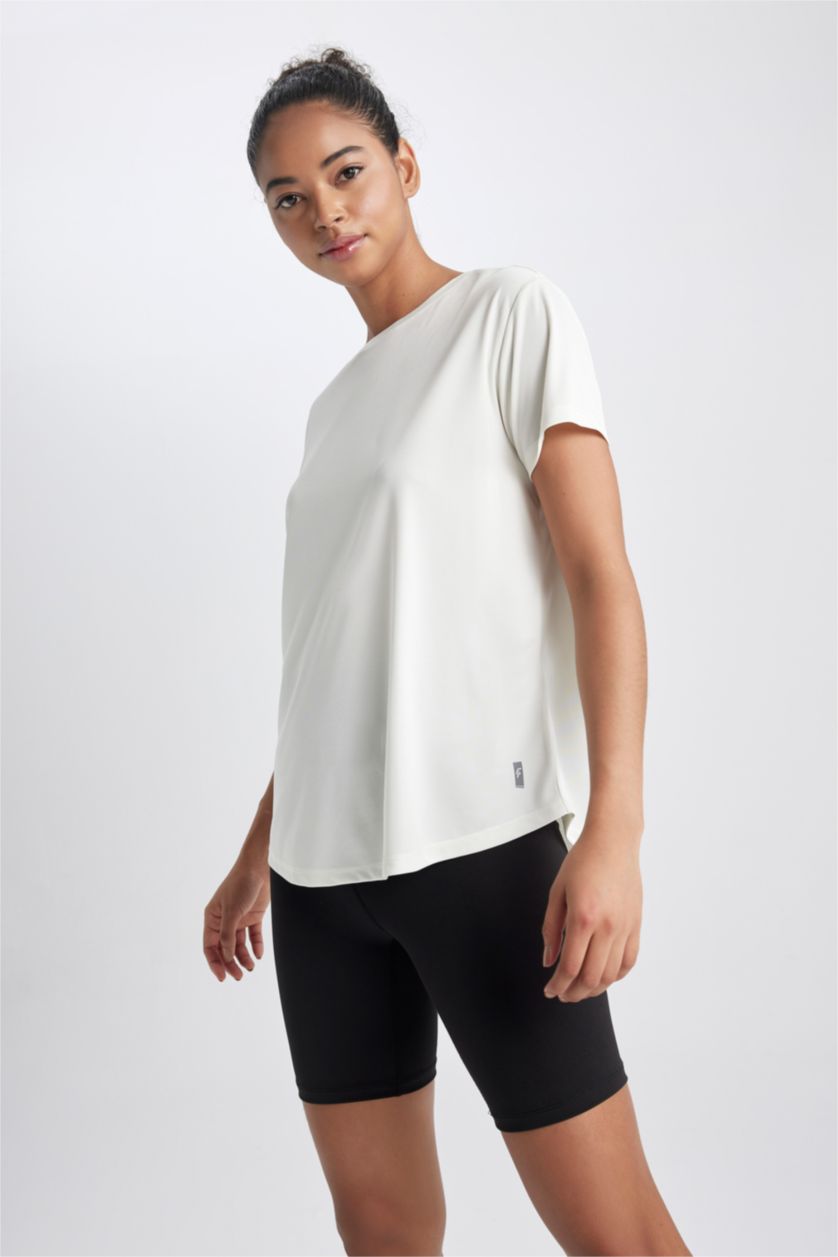 FEMME Beige T-Shirt de sport à manches courtes et col rond