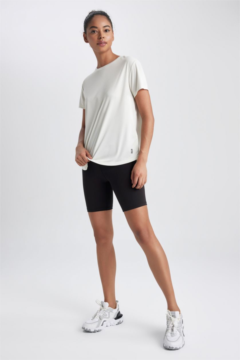 FEMME Beige T-Shirt de sport à manches courtes et col rond