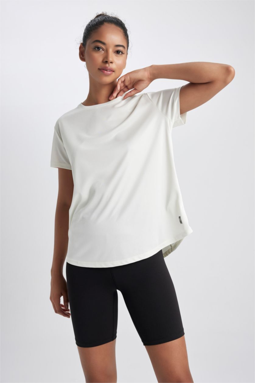 FEMME Beige T-Shirt de sport à manches courtes et col rond