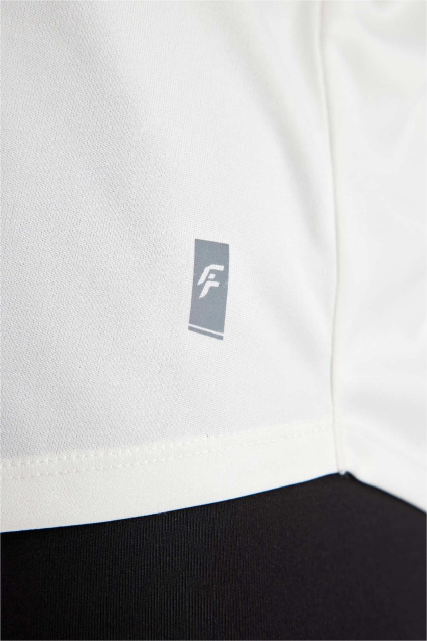 FEMME Beige T-Shirt de sport à manches courtes et col rond