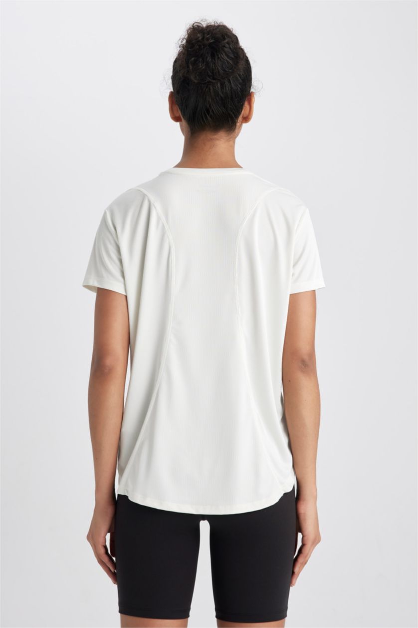 FEMME Beige T-Shirt de sport à manches courtes et col rond