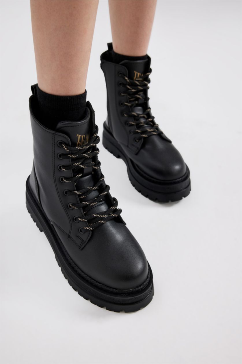 حريمي أسود بوت حريمي بكعب سميك برباط وسوسته