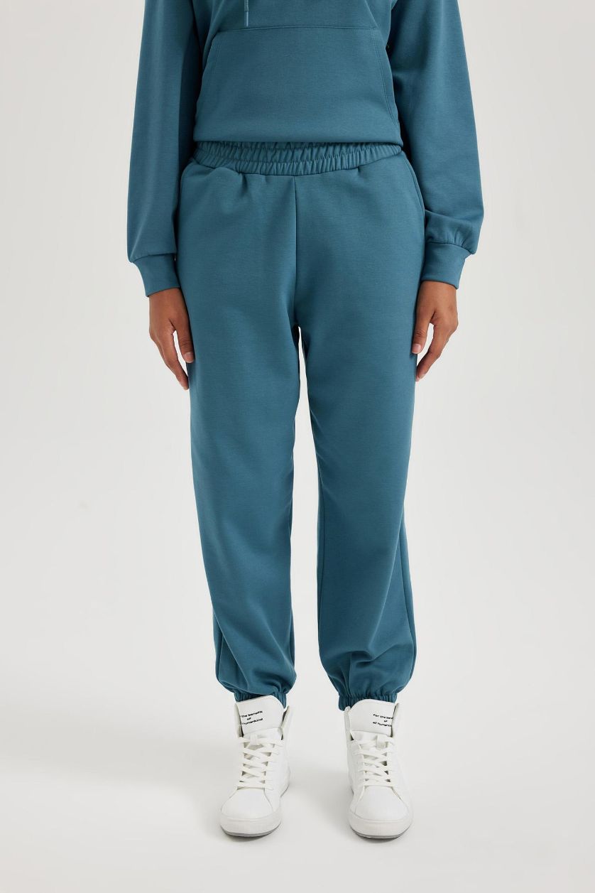 نساء نيلي فاتح بنطلون بجامة رياضي اوفر سايز بجيب من DeFactoFit