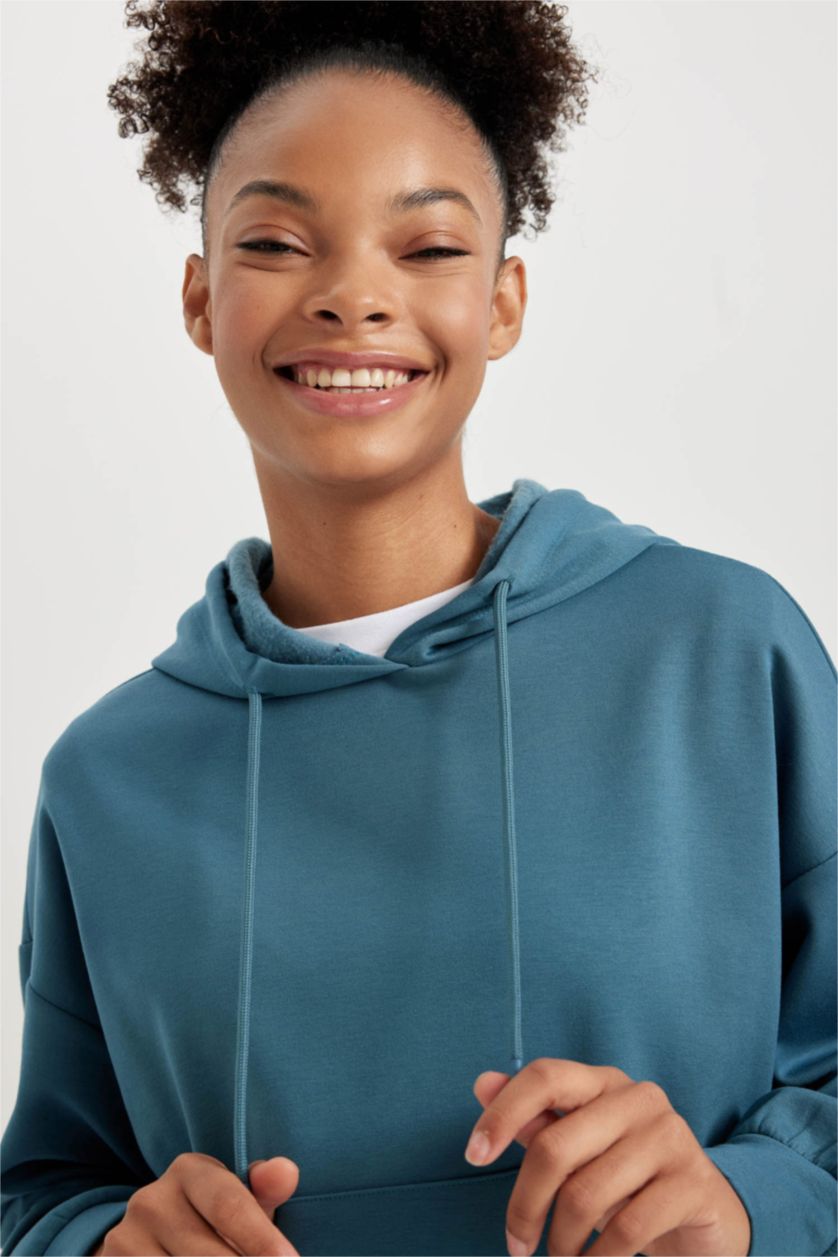 حريمي نيلي فاتح سويت شيرت رياضي بكابيشون بجيب