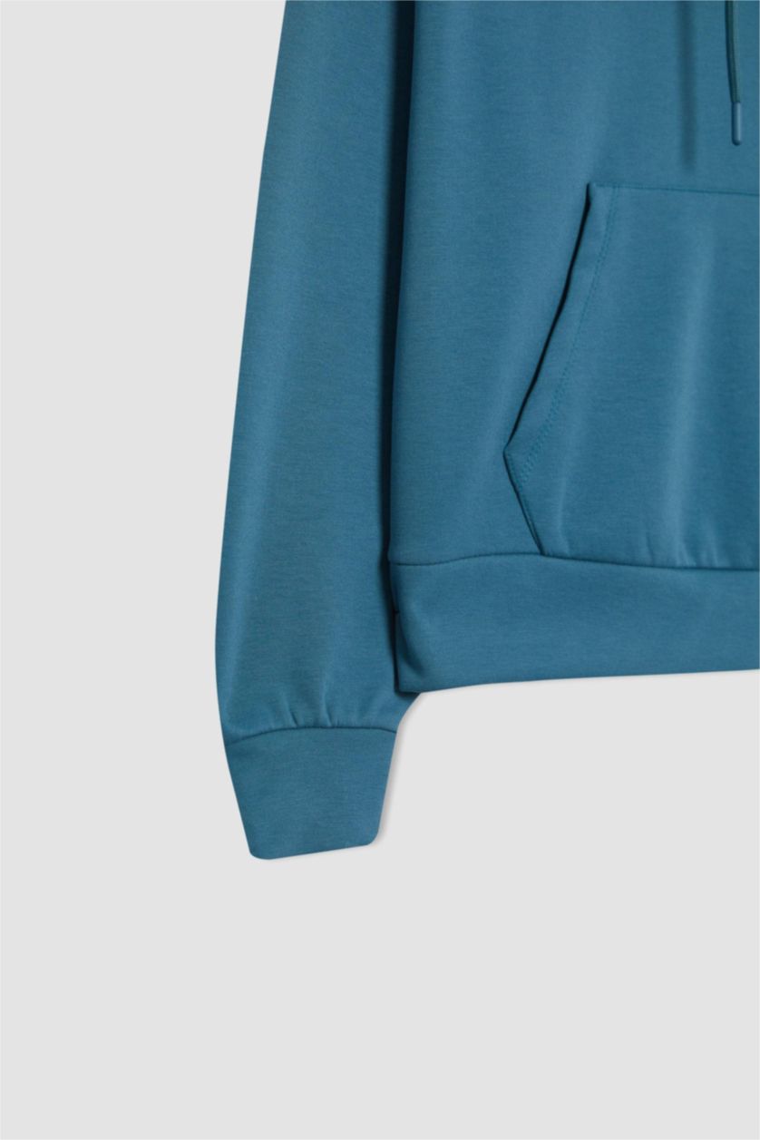 حريمي نيلي فاتح سويت شيرت رياضي بكابيشون بجيب