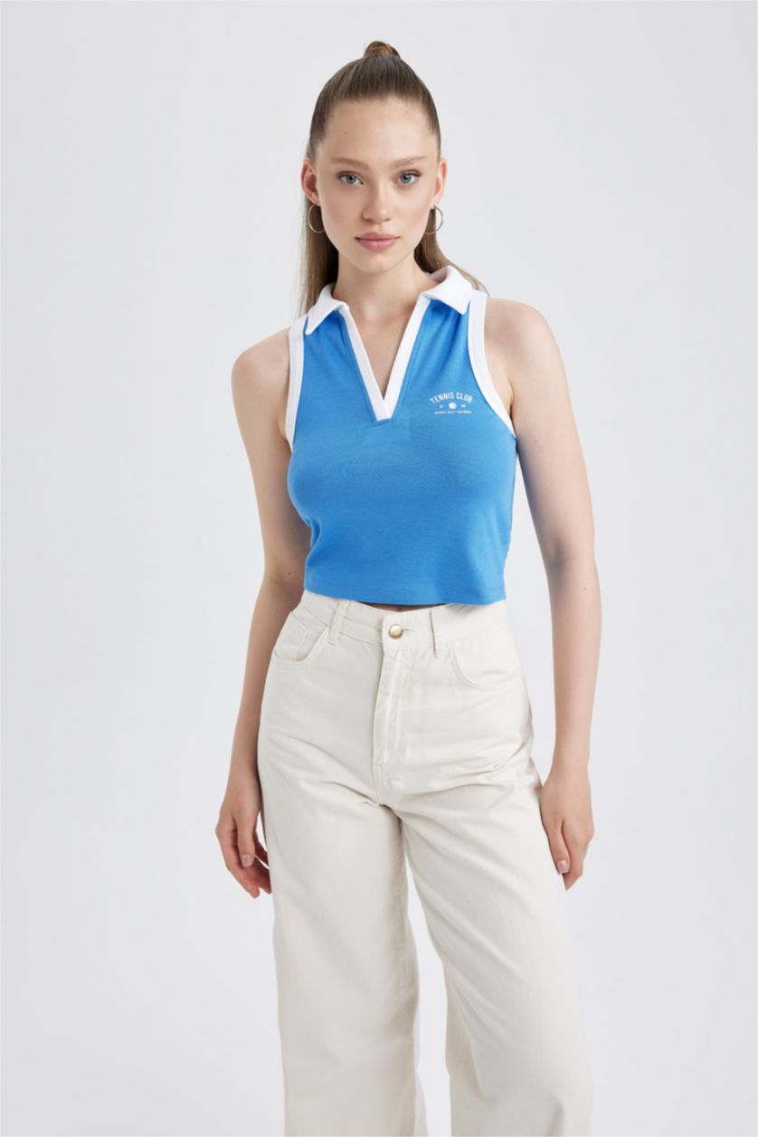 نساء ملكي فاتح كروب توب مخصر بطبعة شعار