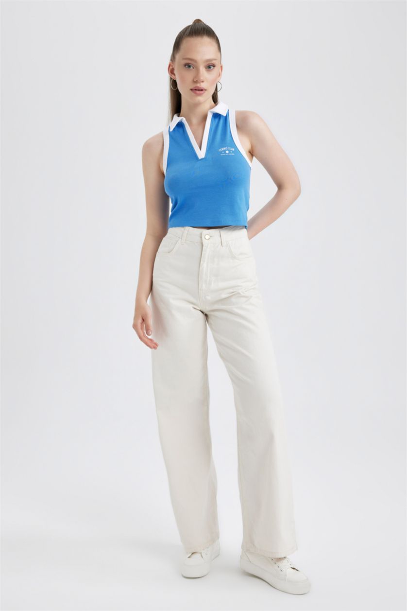 نساء ملكي فاتح كروب توب مخصر بطبعة شعار