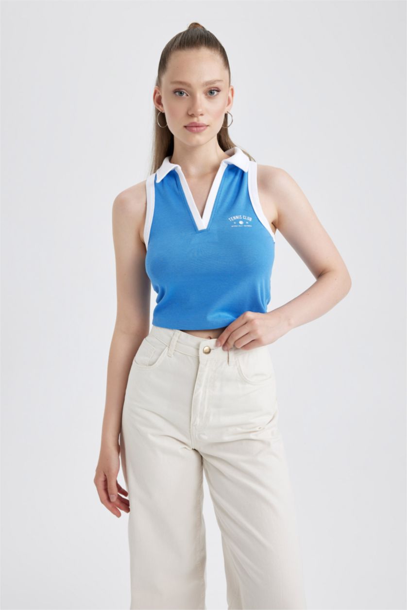 نساء ملكي فاتح كروب توب مخصر بطبعة شعار