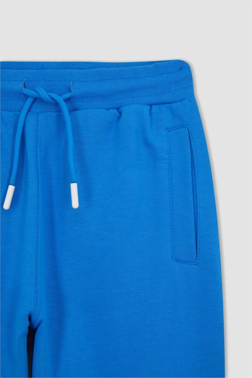 أولاد أزرق بنطلون اولادي قماش رقيق قصة عادية