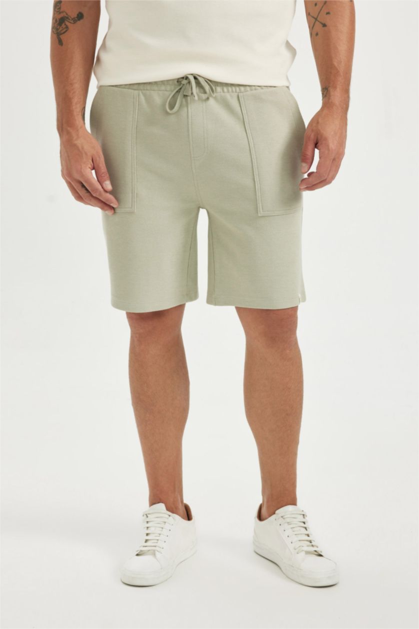 رجال كاكي فاتح شورت سليم فيت وخصر مطاطي