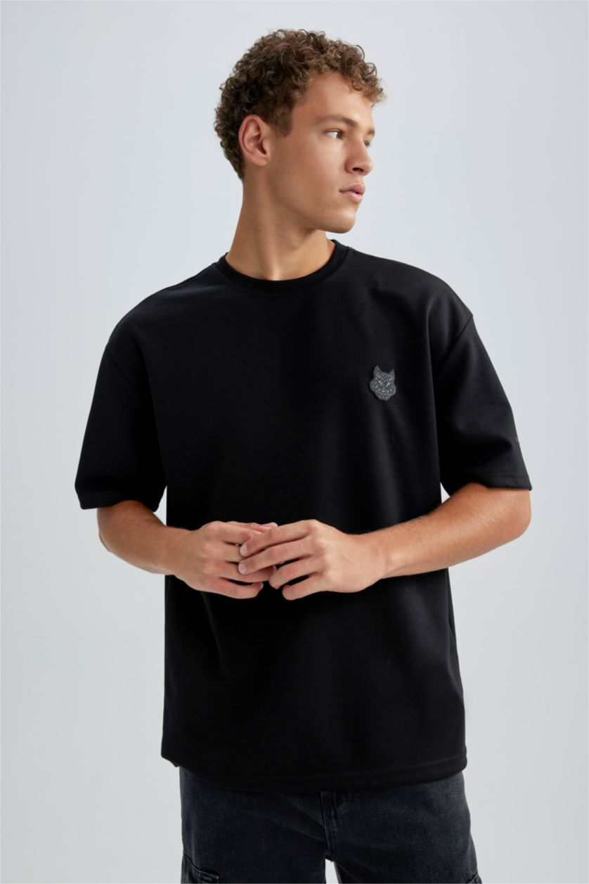 رجال أسود تي شيرت مطبوع اوفر سايز برقبة مستديرة