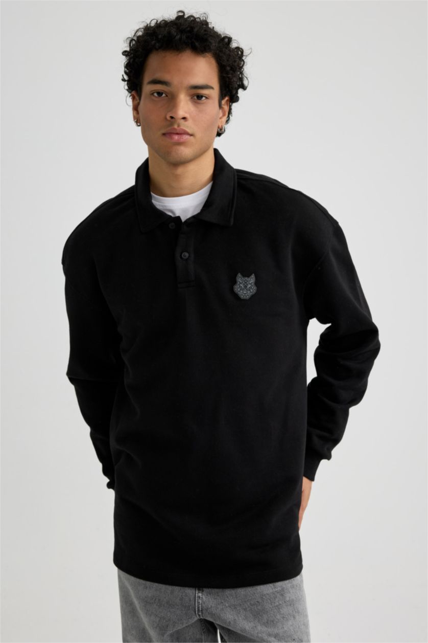 MAN Black Boxy Fit Polo Neck Back Printed Printed Sweatshirt
