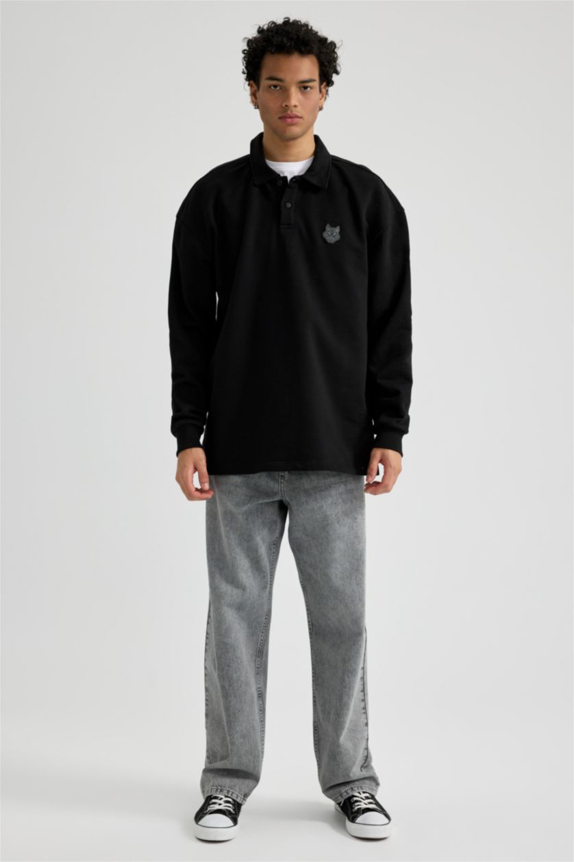 MAN Black Boxy Fit Polo Neck Back Printed Printed Sweatshirt