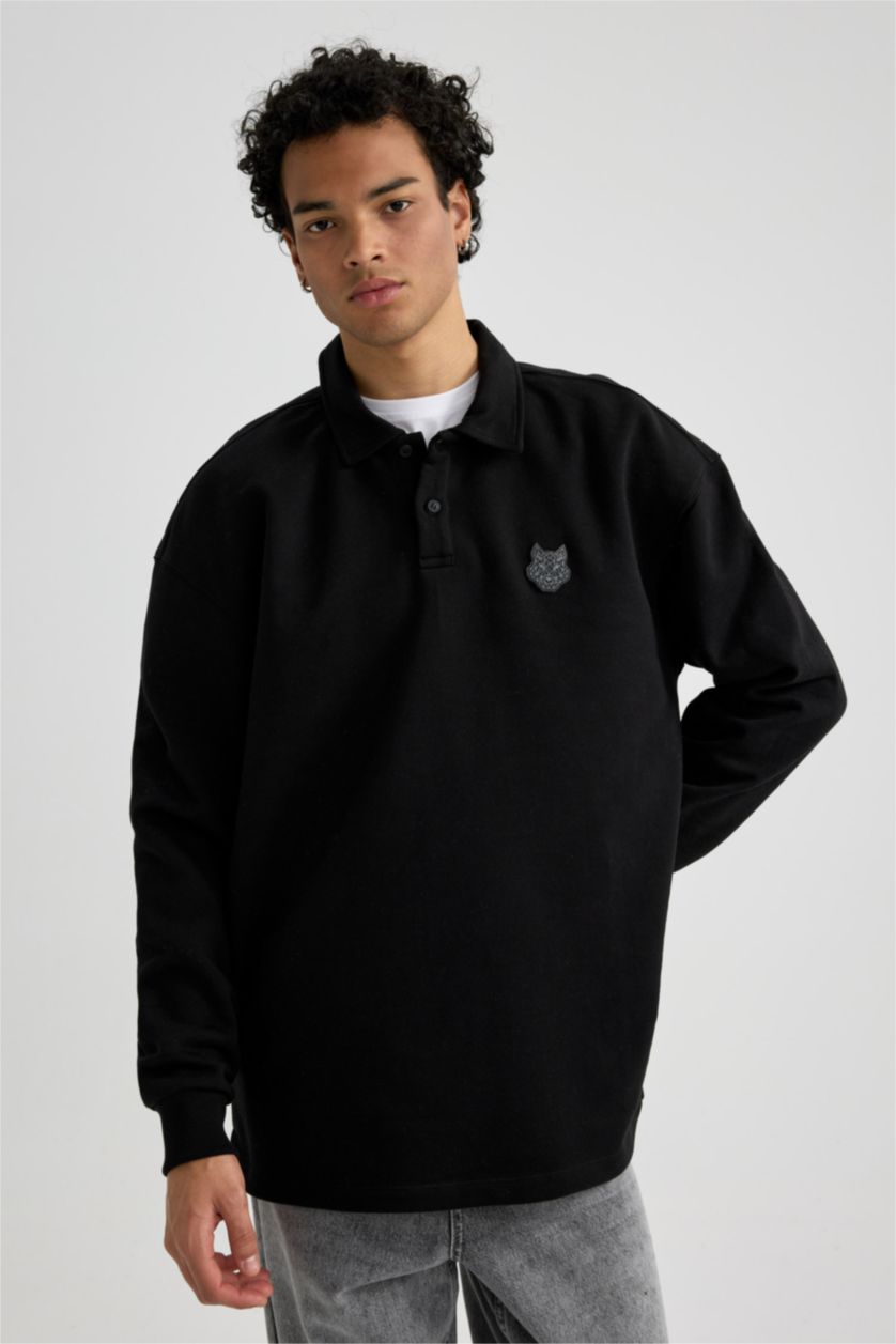 MAN Black Boxy Fit Polo Neck Back Printed Printed Sweatshirt