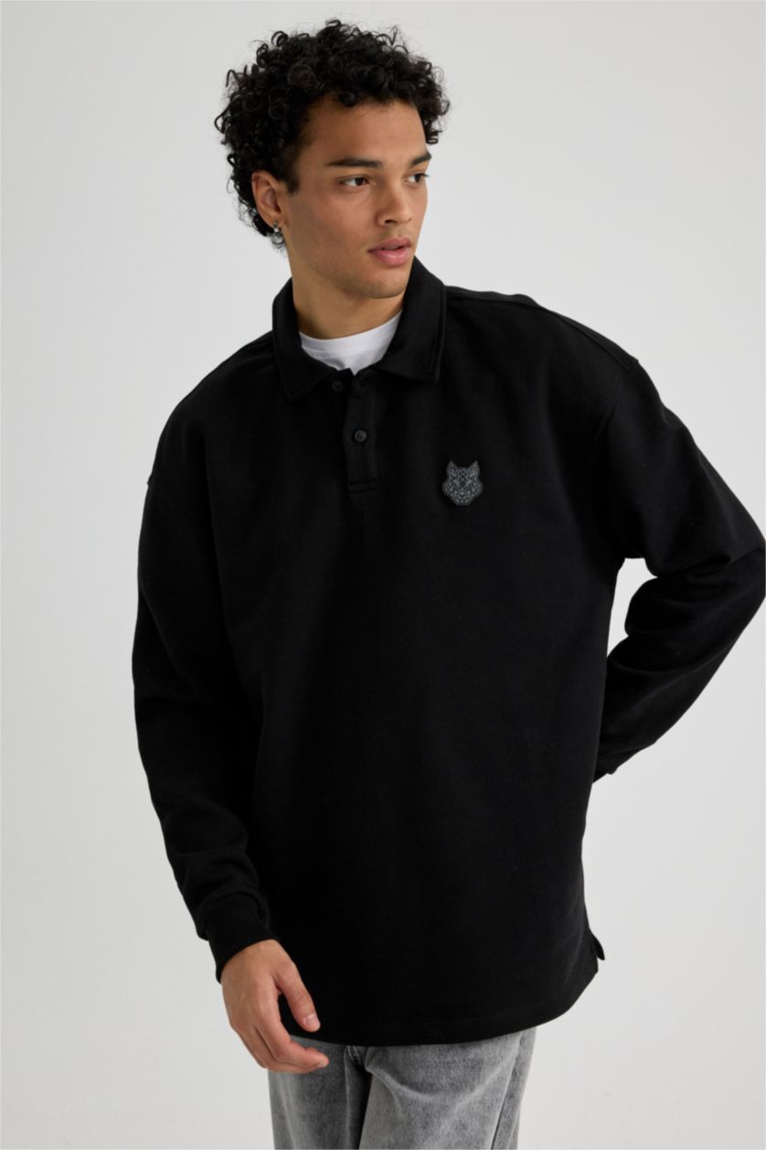 MAN Black Boxy Fit Polo Neck Back Printed Printed Sweatshirt