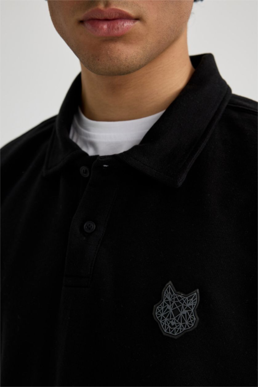 MAN Black Boxy Fit Polo Neck Back Printed Printed Sweatshirt