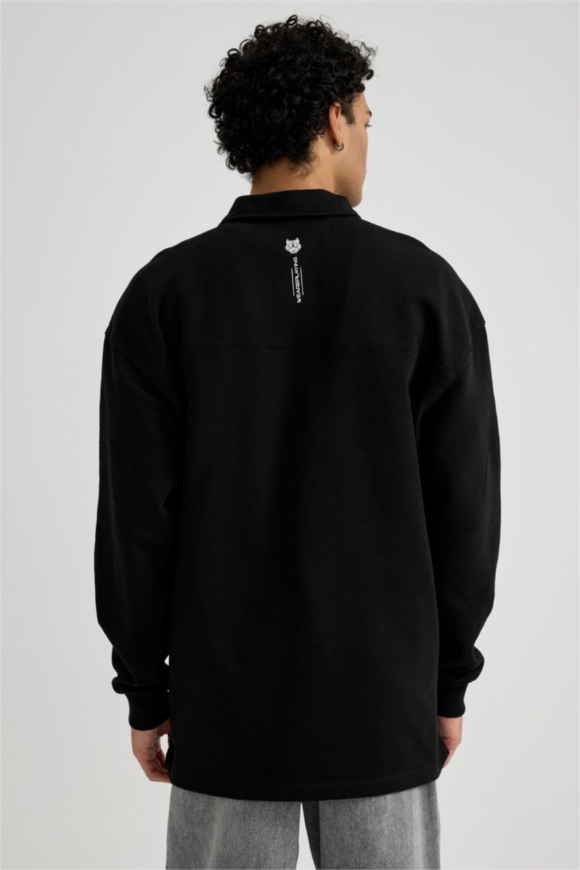 MAN Black Boxy Fit Polo Neck Back Printed Printed Sweatshirt
