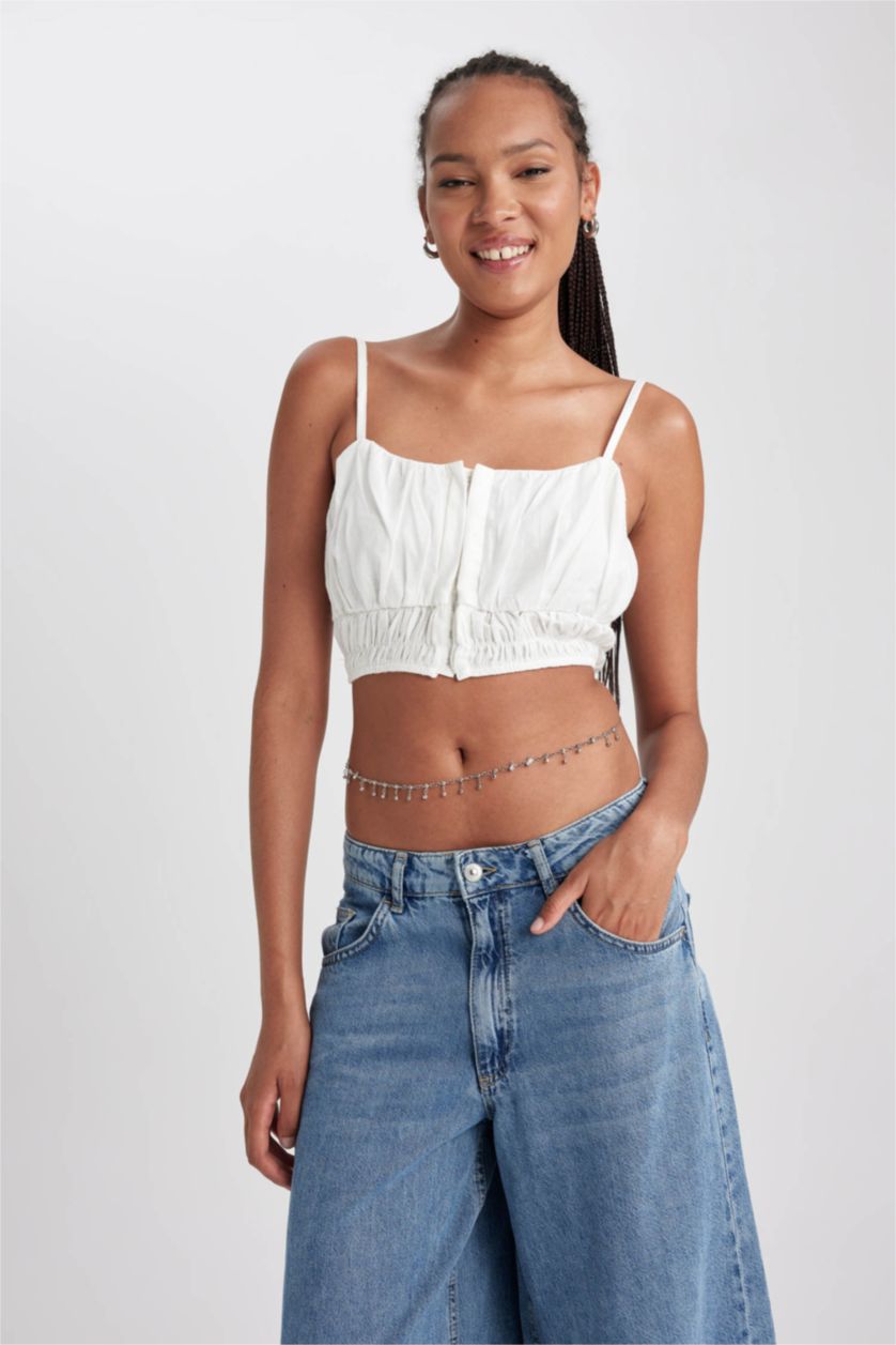 Woman Ecru V-Neck Sleeveless Blouse