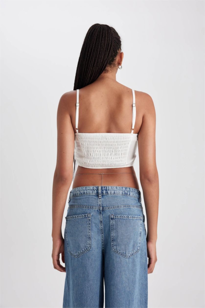 Woman Ecru V-Neck Sleeveless Blouse