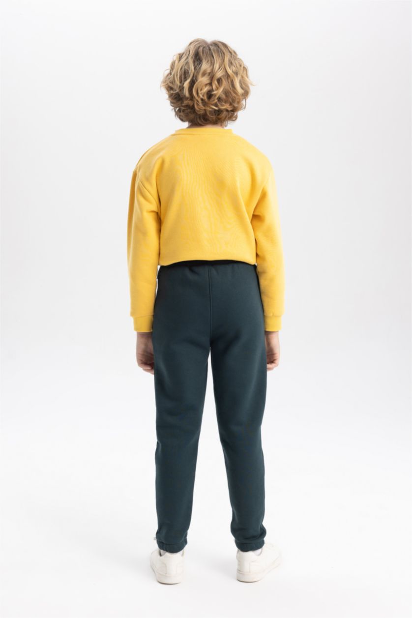 أولادي أخضر غامق بنطلون سويت بانتس اولادي تقيل قصة عادية