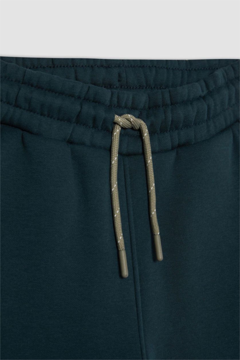 أولادي أخضر غامق بنطلون سويت بانتس اولادي تقيل قصة عادية