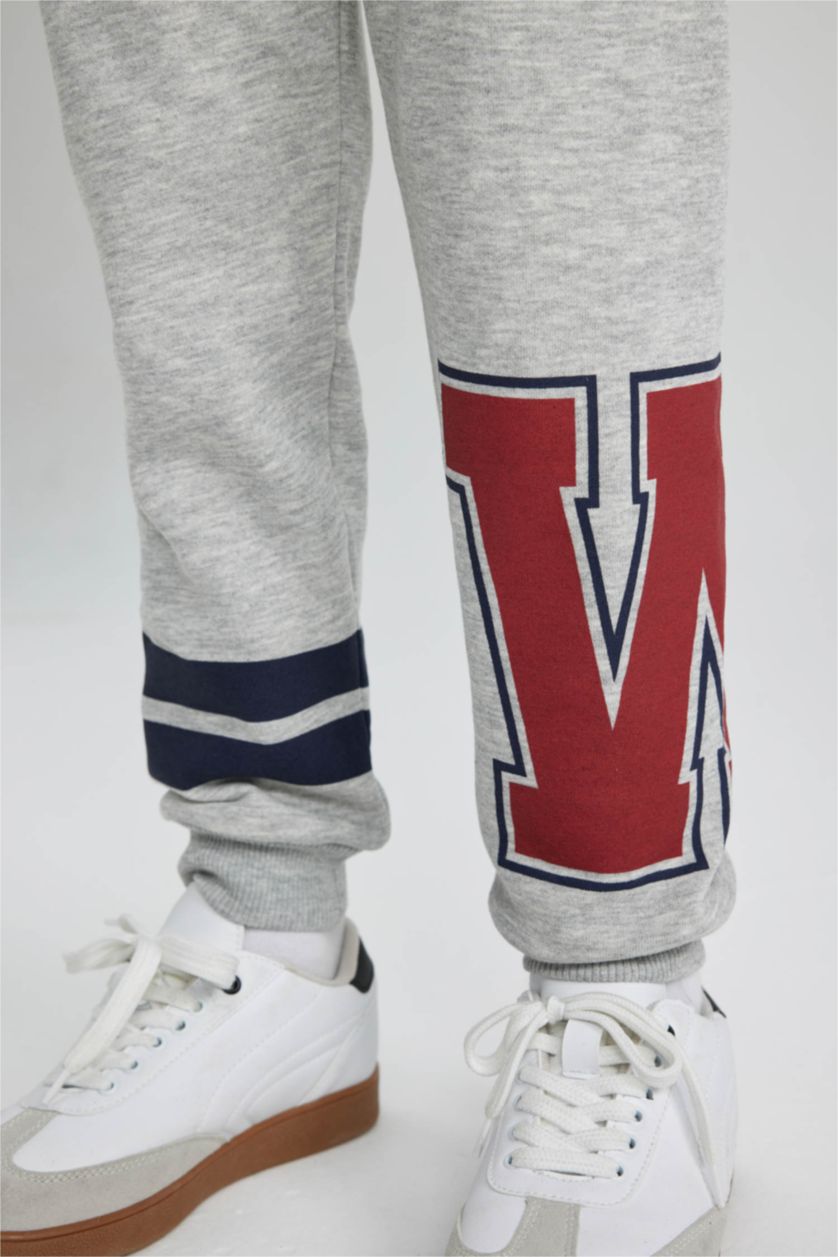 Мальчики и подростки Серый меланж Штаны джоггеры с принтом для мальчиков