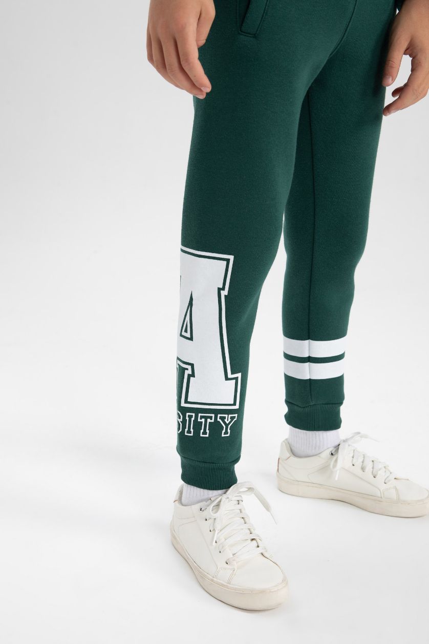 أولادي أخضر غامق بنطلون سويت بانتس اولادي تقيل قصة عادية