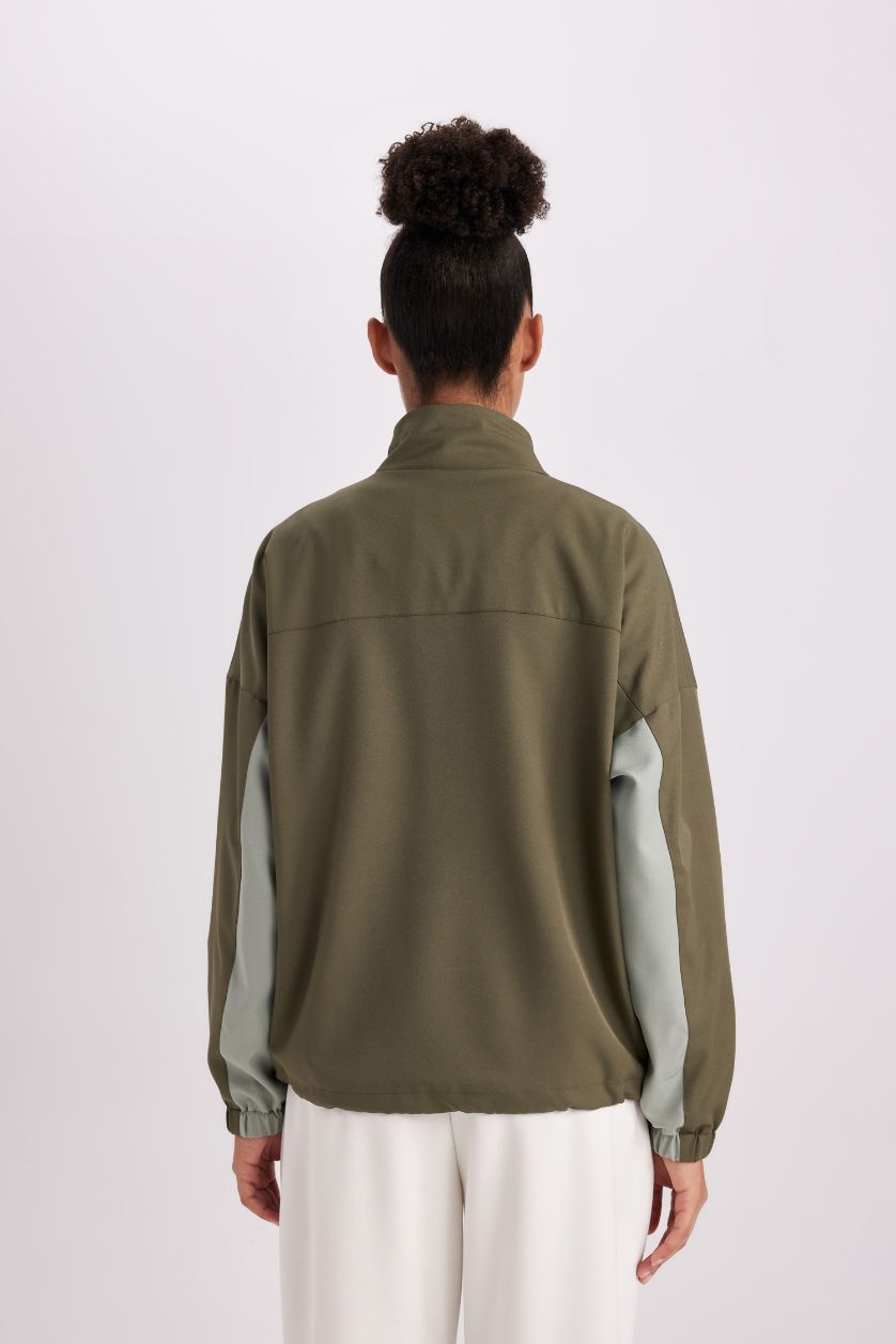 حريمي أخضر جاكيت خفيف قصة عادية مقاوم للماء ببطانة شبكية وياقة عالية