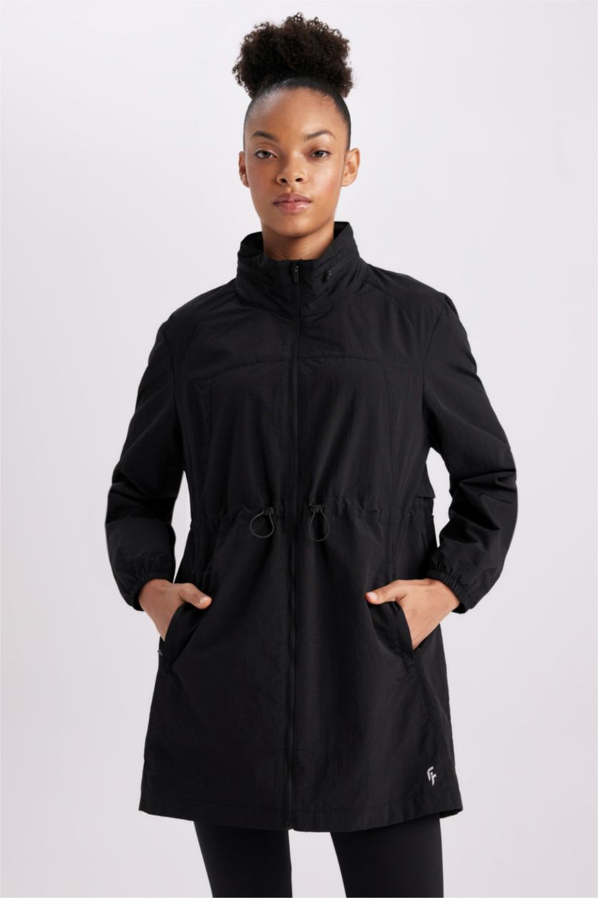 نساء أسود جاكيت مطر سليم فيت بغطاء للرأس طارد للماء من DeFactoFit