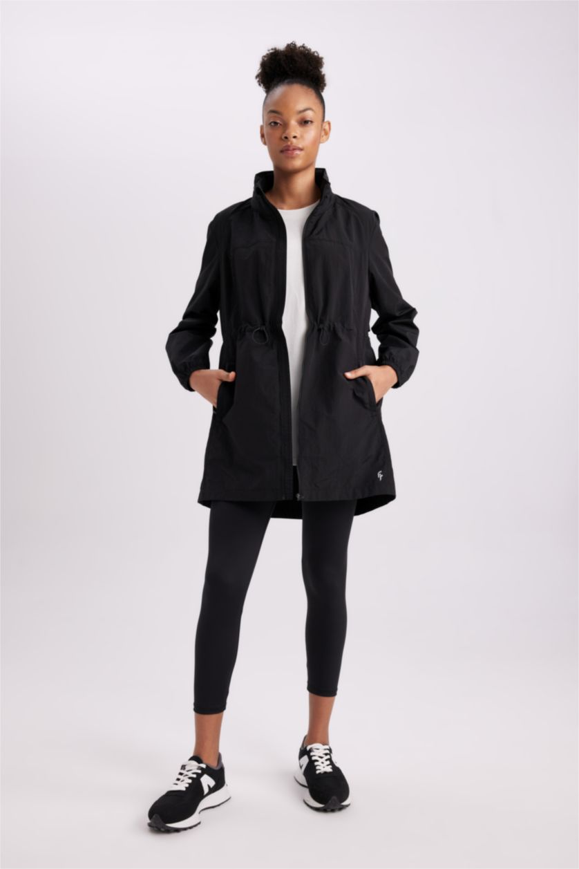 نساء أسود جاكيت مطر سليم فيت بغطاء للرأس طارد للماء من DeFactoFit