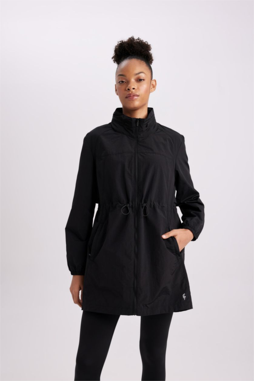 نساء أسود جاكيت مطر سليم فيت بغطاء للرأس طارد للماء من DeFactoFit